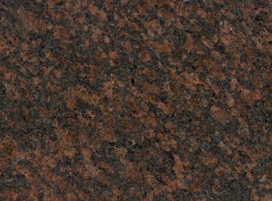Гранит Дымовский( Балтийский) яркий природный окрас, в основе которого лежит темный базовый цвет со среднезернистыми коричневыми вкраплениями широкого оттеночного ряда,